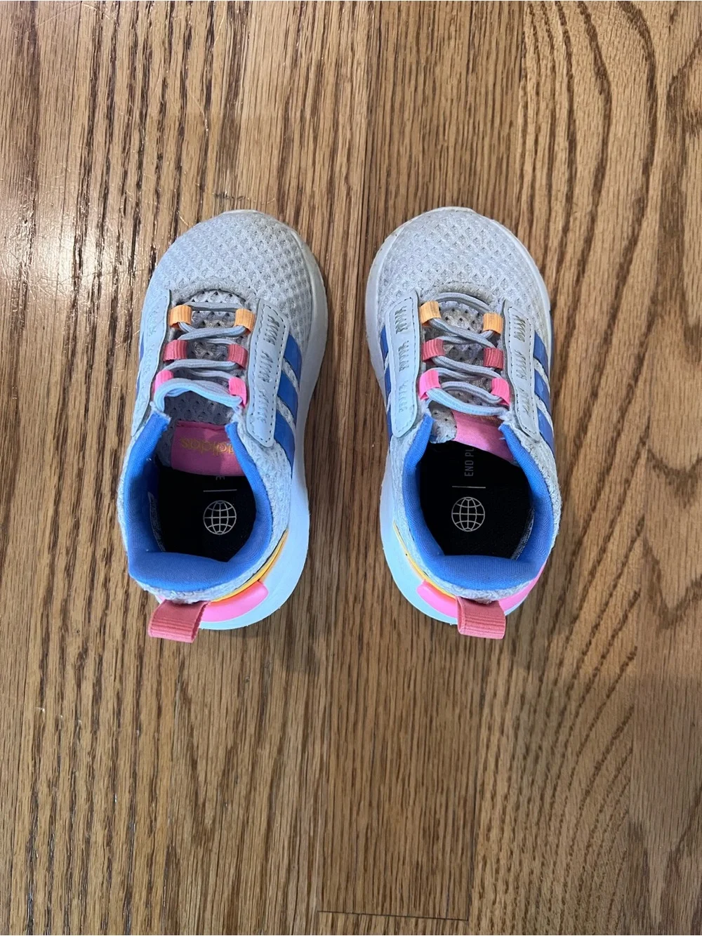 adidas Kids White Mesh Sneakers with Blue Stripes and Yellow & Pink Accents